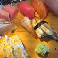 Sushi & Sashimi Combo · 5 pieces nigiri, a California roll, and 9 pieces of sashimi.

*Consuming raw or undercooked ...