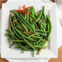 Dried Sautéed String Beans · Fresh string beans in garlic seasoned dry and very flavorful.