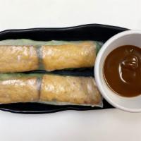 Tofu Spring Rolls (2) · Rice paper wrapped with tofu, vermicelli noodles, lettuce. Served with peanut dipping sauce.
