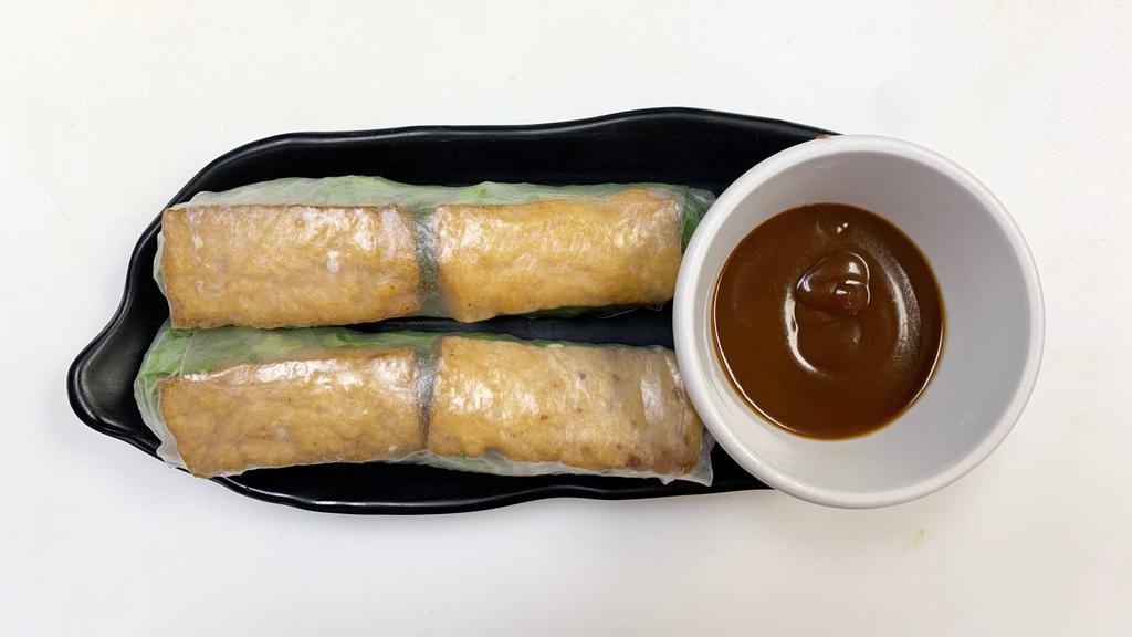 Tofu Spring Rolls (2) · Rice paper wrapped with tofu, vermicelli noodles, lettuce. Served with peanut dipping sauce.