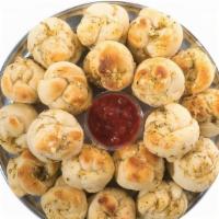 Garlic Knots · Includes our House Red Sauce plus any two of our (all vegan) Signature Sauces