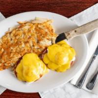 Eggs Benedict · Grilled Canadian bacon on an English muffin, topped with two poached eggs* and hollandaise s...