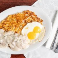 Biscuits & Gravy · Two biscuits smothered in our homemade sausage gravy served with two eggs* and side of hash ...