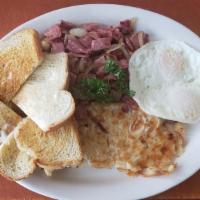 Corned Beef Hash & Eggs · Our homemade corned beef hash mixed with freshly chopped onions and homemade seasoned potato...