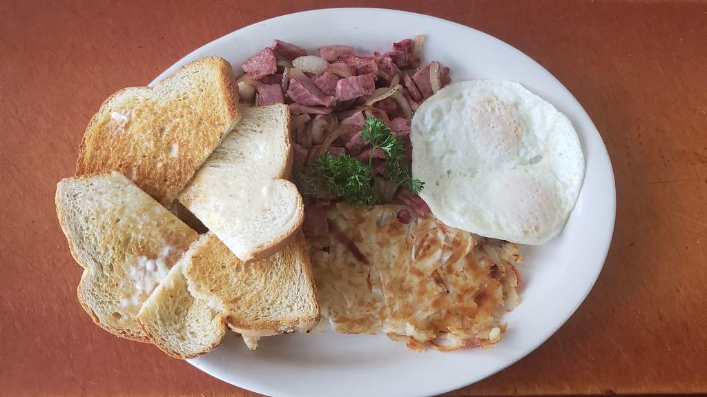 Corned Beef Hash & Eggs · Our homemade corned beef hash mixed with freshly chopped onions and homemade seasoned potatoes or hash browns. Served with two farm fresh eggs* your style and choice of toast.