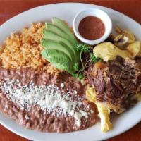Machaca · Seasoned shredded beef grilled with fresh onions and tomatoes all scrambled with eggs. Serve...