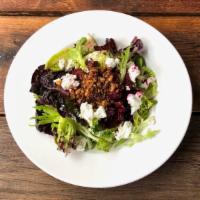 Bohemian Beet Salad · Mixed greens with beets, onions, and goat cheese topped with house balsamic vinaigrette dres...