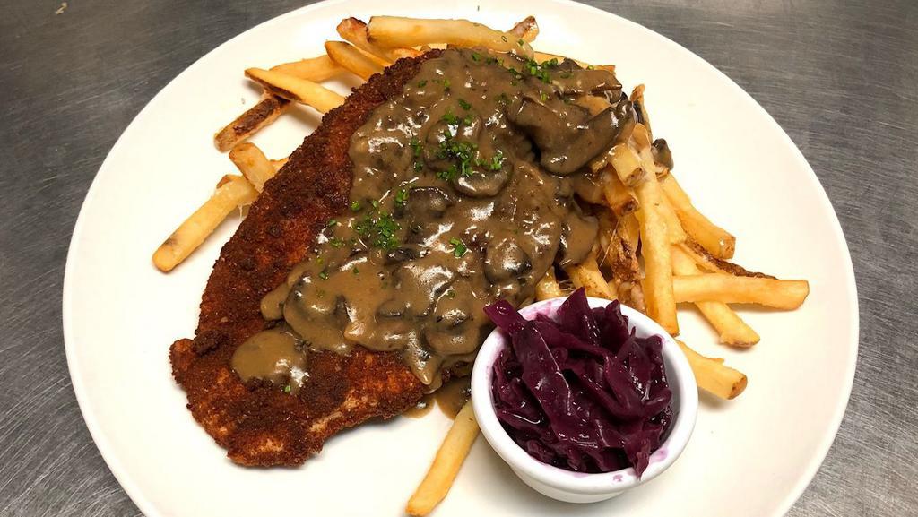 Jager Schnitzel · Choice of either chicken or pork. Served with creamy mushroom sauce, red cabbage, and your choice of cheesy fries or spätzle.