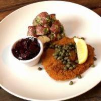 Chicken Schnitzel · Topped with lemon and capers. Served with a side of potato salad and your choice of cucumber...