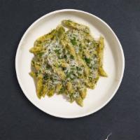 Pesto Pasta · (Vegetarian) Fresh Cavatappi pasta cooked in a pesto sauce and topped with black pepper, par...