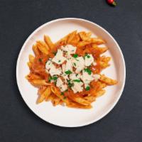 Vodka Pasta · (Vegetarian) Fresh Cavatappi pasta cooked in a pink vodka sauce and topped with parmesan, pa...