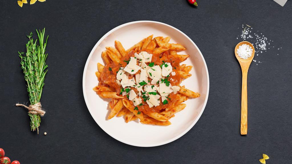 Vodka Pasta · (Vegetarian) Fresh Cavatappi pasta cooked in a pink vodka sauce and topped with parmesan, parsley, and garlic.