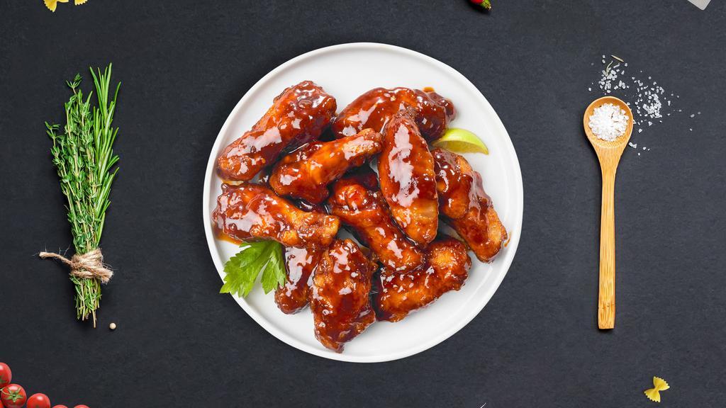 Bbq Chicken Wings · Fresh chicken wings breaded, fried until golden brown, and tossed in barbecue sauce. Served with a side of ranch or bleu cheese.