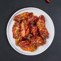 Jalapeno Teriyaki  · Fresh chicken wings breaded, fried until golden brown, and tossed in jalapeno and teriyaki s...