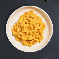Classic Mac · Traditional rich and creamy mac and cheese with Cavatappi pasta.