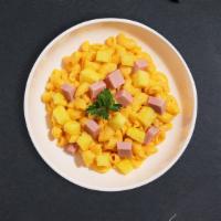 Hawaiian Mac · Pineapple and ham cooked in a blend of creamy cheese with Cavatappi pasta.