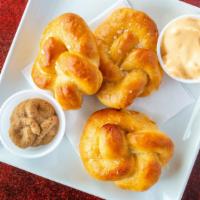 Pretzel Knots · Fresh-baked, local from Marc Anthony's served with b.o.t.b. Beer cheese sauce or beer mustar...