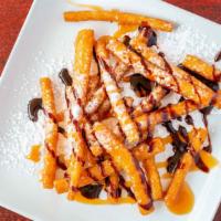 Funnel Cake Fries · Funnel Cake Fries with powdered sugar.