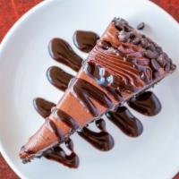 Ultimate Chocolate Cake · Chocolate cake, velvety chocolate mousse between layers, chocolate cookie crust, chocolate g...