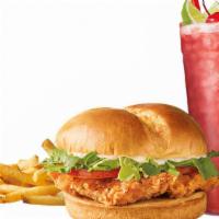 Classic Crispy Chicken Sandwich Combo · Lightly seasoned and breaded 100% all white meat chicken breast topped with fresh lettuce, r...