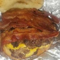 Brady Bacon Burger · Two  beef patties and bacon with the toppings of your choice.