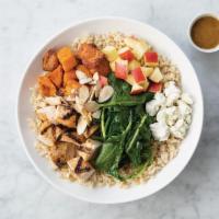 Harvest Bowl · Grilled chicken, spiced sweet potatoes, organic apples, goat cheese, toasted almonds, sauteé...