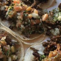 Small Taco · Onions, cilantro & salsa.
 Chicken & carnitas are served with pico de gallo.
Birria tacos ar...