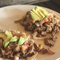 Jalisco Taco · Served in corn tortillas with beans, Mexican salsa & sliced of avocado.