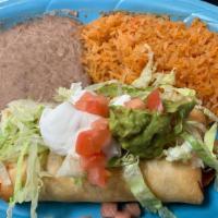 #1. Chimichanga · Served with guacamole & sour cream