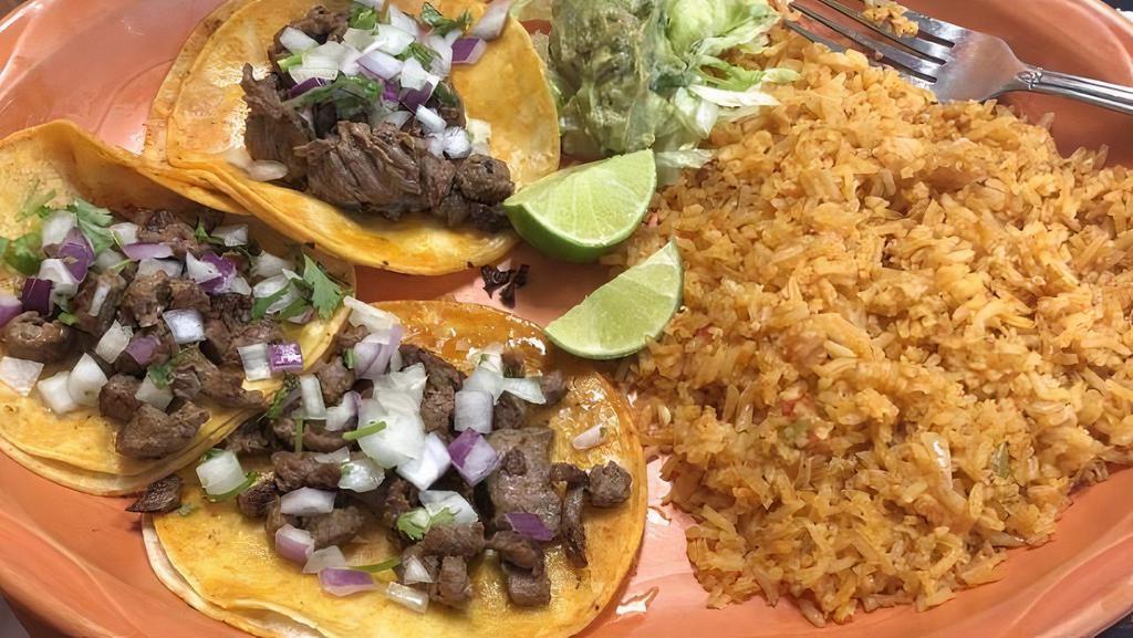 Carne Asada Street Tacos  · Three steak soft tacos topped with cilantro & onion.