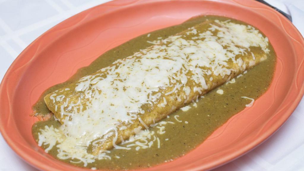 Burrito Amigo  · A flour tortilla filled with pork chile verde, Spanish rice, & refried beans. Topped with melted cheese & green salsa.