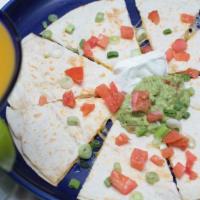 Quesadilla · Large flour tortilla stuffed with melted cheese served with sour cream, guacamole, fresh tom...