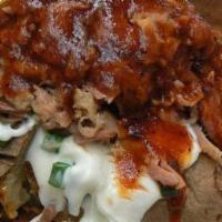 Loaded Bbq Potato · Comes with butter, Cheddar cheese, sour cream, chives, and your choice of meat.