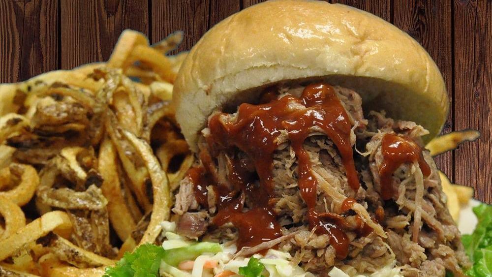 Pulled Pork Dinner · Premium butcher grade shoulder, rubbed with our special seasonings and slowly smoked.