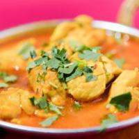 Chicken Curry · Succulent pieces of chicken simmered in a smooth, velvety ginger, garlic, onion, and tomato ...