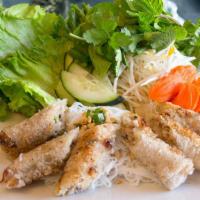 Vietnamese Egg Rolls (6) · PORK OR VEGGIE with mushroom filling
Fried, served with rice noodles topped with onions and ...