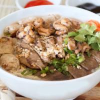 Combo Bowl · Vietnamese pork egg rolls, grilled beef, pork, and shrimp.