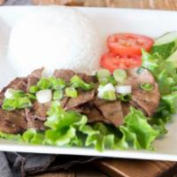 Grilled Beef Platter · marinated with lemongrass seasoning, grilled, and topped with onions; served with white rice...