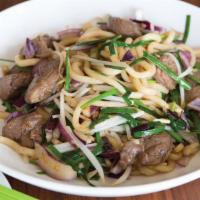 Tenderloin Undon · Japanese style noodles (wheat flour) stir-fried with garlic, chives, bean sprouts, onions, a...