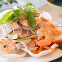 Shrimp And Pork Lotus Stem Salad  · GF-Poached shrimp and pork, julienned lotus stems, cucumbers, bell peppers, carrots, onions,...