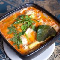 Tom Yum (Large) · In spicy and sour soup with lemongrass, kaffir lime leaves, onions, tomato, mushrooms, lime ...