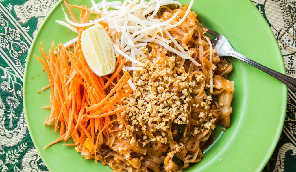 Pad Thai · Pan fried rice noodles, bean sprouts, green onions, egg, and topped with ground peanuts