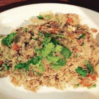 Fried Rice · Onions, tomatoes, peas, carrots, and egg topped with black pepper, cilantro, cucumber and to...