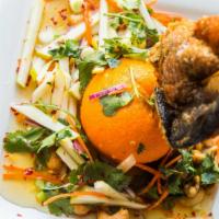 Crispy Trout · Deep fried trout with red onions, fresh green apples, carrots, cashew nuts, lemongrass, slic...