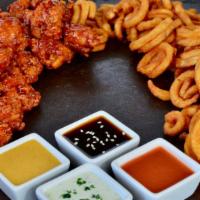 32 Boneless Wings · 32 count - Served with lots of curly fries or tots + 4 free 
