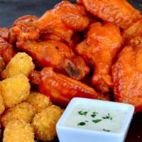 6 Bone-In Wings · 6 count - Served with free curly fries or tots + free 