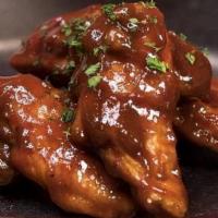 House Made Bbq Wings Combo (8 Pcs) · Perfectly Cooked Chicken Wings Tossed in Homemade BBQ Sauce. 
Combo comes with Your Choice o...