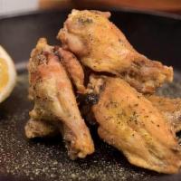 Lemon Pepper Rub Wings Combo (8 Pcs) · Perfectly Cooked Chicken Wings Topped w/ Lemon Pepper Rub.
Combo comes with Your Choice of a...