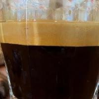 Espresso · A double shot of espresso crafted from single-origin specialty coffee