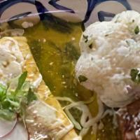 Pulled Chicken Enchiladas · Oaxacan & Monterey Jack cheese & slow-cooked pulled chicken marinated in chiles, wrapped in ...